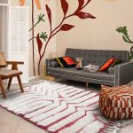 Tapis rose motifs abstraits